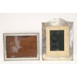 A plain rectangular photograph frame with arched top, 11¼” x 8", London 1919, by Asprey & Co.; &