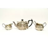 A George V three-piece tea service of lobed oval design; London 1920-3, by David Landsborough