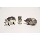 An Edwardian pin-cushion in the form of an elephant, 1¾" wide, Birmingham 1907; another in the