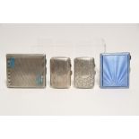 An engine-turned pocket cigarette case with pale blue guilloche enamel front, London 1934; another