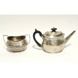 An Edwardian oval teapot with gadrooned rims, London 1902 by Thomas Bradbury & Sons (11 oz); & a