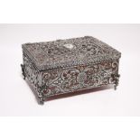 A continental jewellery casket of rectangular shape, the lift lid & all sides entirely covered