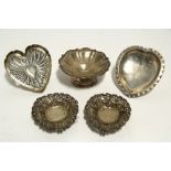A Victorian embossed heart-shaped trinket tray, 4" wide, London 1891 by Wm. Comyns; a plain ditto,