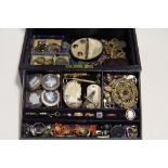 Various items of gem-set & costume jewellery, etc., contained in a purple morocco leather