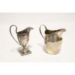 A George III slender ovoid milk jug with reeded loop handle & pricked rim, 4¼" high, London 1801 (