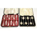 A set of six cake forks, Sheffield 1965; & a set of six coffee spoons, Birmingham 1937; both in