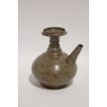 An early Chinese crackleware flask or Kendi, the narrow ribbed neck with wide rim, upright conical
