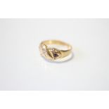 An 18ct gold ring set small diamond & two small rubies; Chester hallmarks for 1913. (2.8oz)