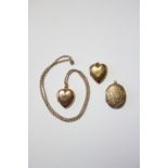 A yellow-metal heart shaped pendant locked set small rose diamond, on yellow metal chain necklet; an