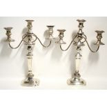A PAIR OF SHEFFIELD TABLE CANDELABRA, each with two reeded scroll arms & a taller central sconce,