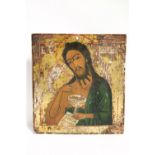 A Greek icon depicting Christ, on wooden panel; 17” x 16”. (w.a.f.).