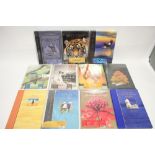 Eleven “Australian Stamps Collection” annual presentation books, 2003-2013; two small albums of