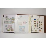 A collection of GB & foreign stamps in various albums, on album leaves, in bundles, & loose in small