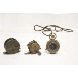 A Verners pattern “VII” brass cased pocket compass; & two small fishing reels.