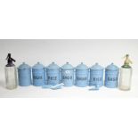 A set of seven pale blue enamelled kitchen cylindrical storage jars; together with eight various