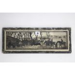 A silhouette reverse painting on glass depicting a fox-hunting scene, 4¾” x 16¾”, framed.