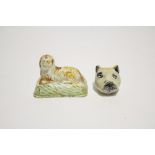 A late 18th/early 19th century Pratt-type small model of a recumbent spaniel, on oblong base, 2¼"