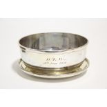 A George V circular deep bowl with engraved initials & date, 5¼” diam., with matching saucer