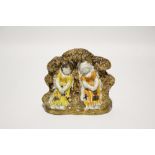 A late 18th/early 19th century Pratt-type pottery ‘Babes-in-the-Wood” group of two children asleep