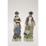 A PAIR OF LATE 18th/EARLY 19th Century STAFFORDSHIRE PEARLWARE MALE & FEMALE STANDING FIGURES, the