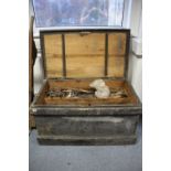 A late 19th/early 20th century black painted deal carpenter’s chest with hinged lift-lid & rope side