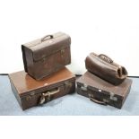 A tan leather Gladstone-type bag; a tan leather briefcase; & two tan leather suitcases.