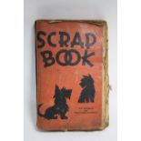 A scrap album containing various scraps & greetings cards; together with various vintage