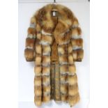 A fox fur three-quarter length ladies’ coat.