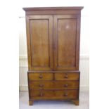 An early Victorian mahogany linen press,