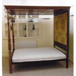 A 1920s mahogany four poster bed, having