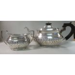 A silver teapot of oval, bulbous, demi-r