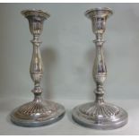 A pair of late 19thC silver plated candl