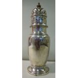 A silver caster of baluster vase design,