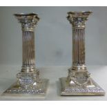 A pair of late Victorian loaded silver c