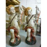 A pair of modern ceramic figures, each a