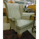 A pair of modern wingback armchairs, uph