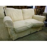 A modern two seater settee, having a lev