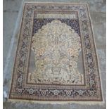 An Oriental rug with a vase of flowers s