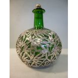 A green glass bulbous bottle, having a n