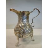 A George II silver cream jug of ovoid fo