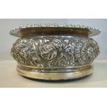 An early 19thC silver wine coaster of og