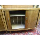 A 1960s teak finished bow front record c