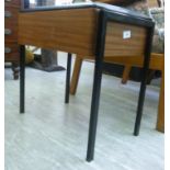 A 1960s teak finished stool, the black f