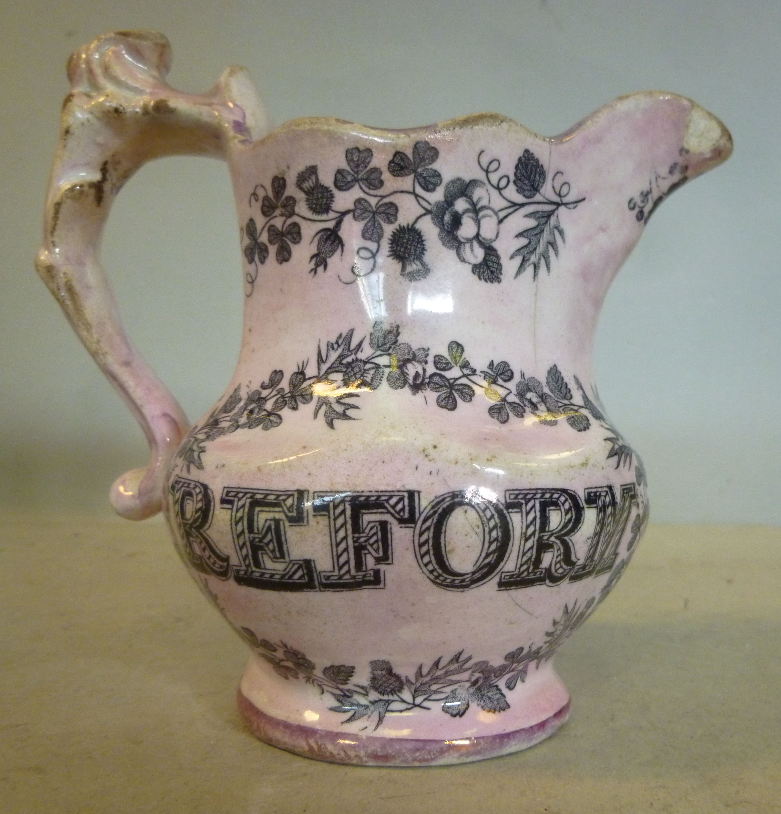 An early/mid 19thC tinted pink lustre gl