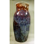 A Ruskin pottery vase of slender baluste