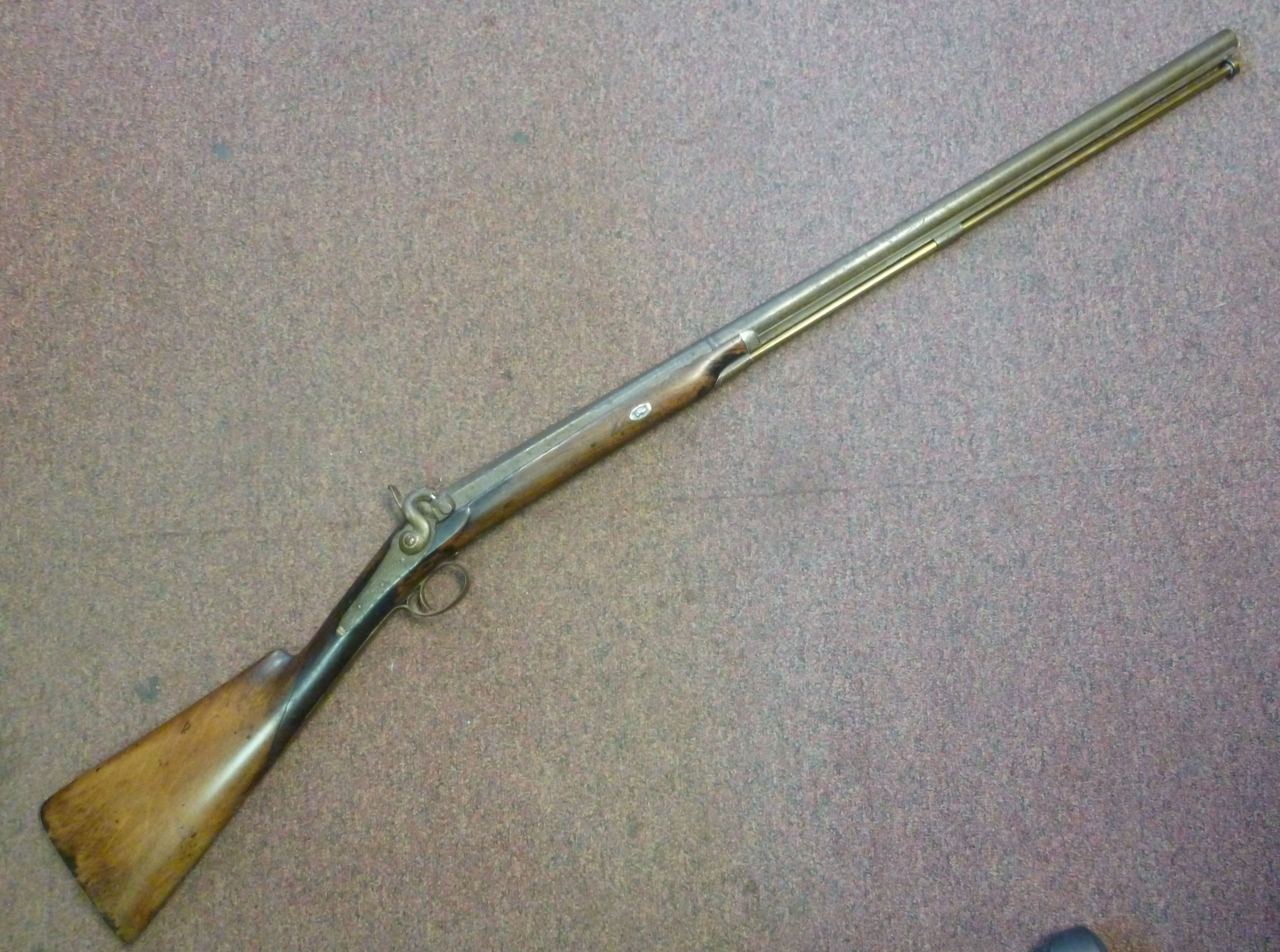 A mid 19thC percussion action rifle with