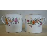 A pair of Newhall porcelain coffee cans,