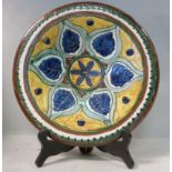 A Carlo Manzoni pottery footed dish, dec