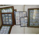 Seven sets of framed cigarette cards: to