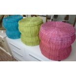 Three variously coloured woven plastic,